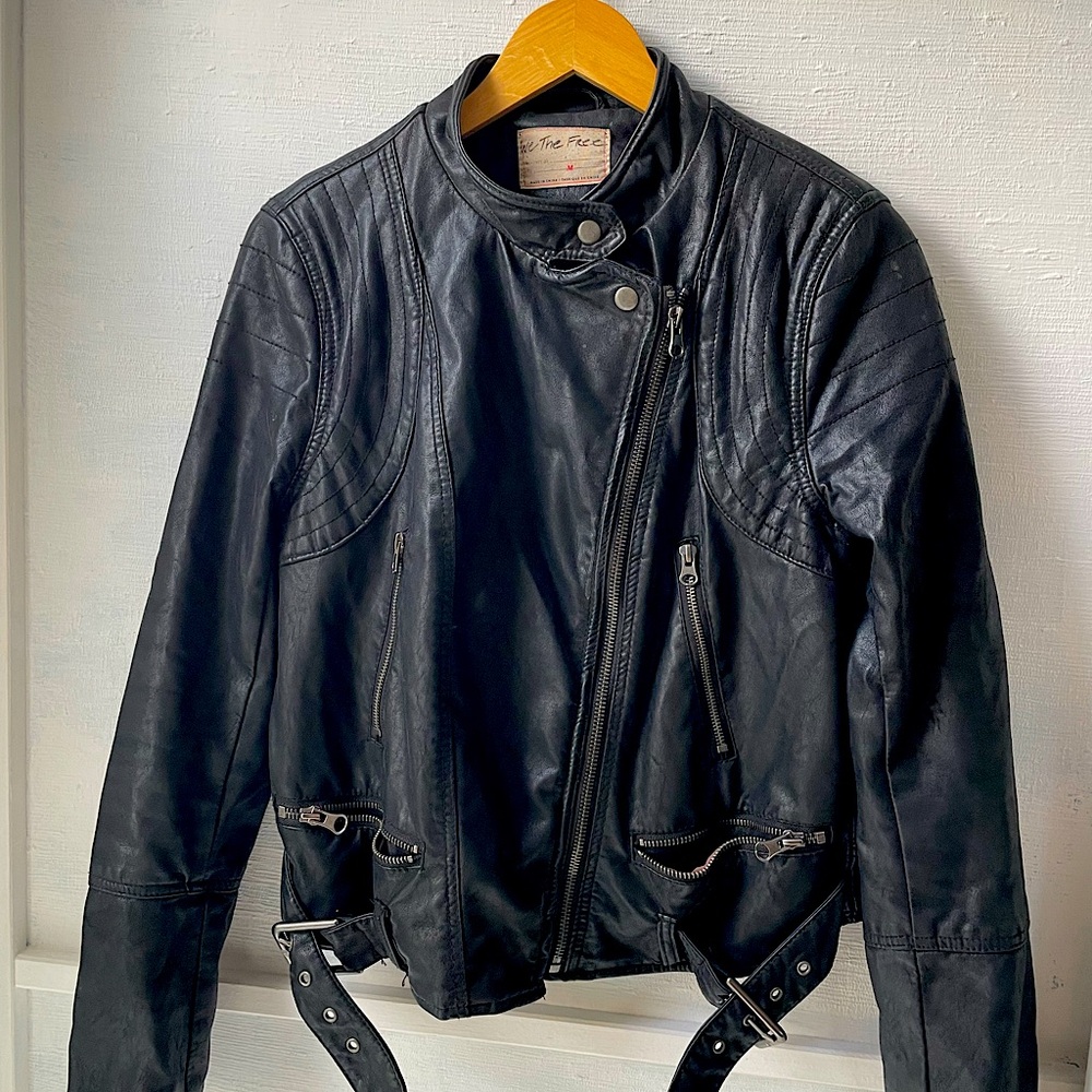 We The Free leather biker jacket with buckle detailing.